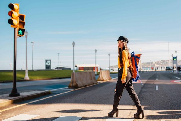 How can one arrange a guided tour of the ancient ruins in Anglesey?